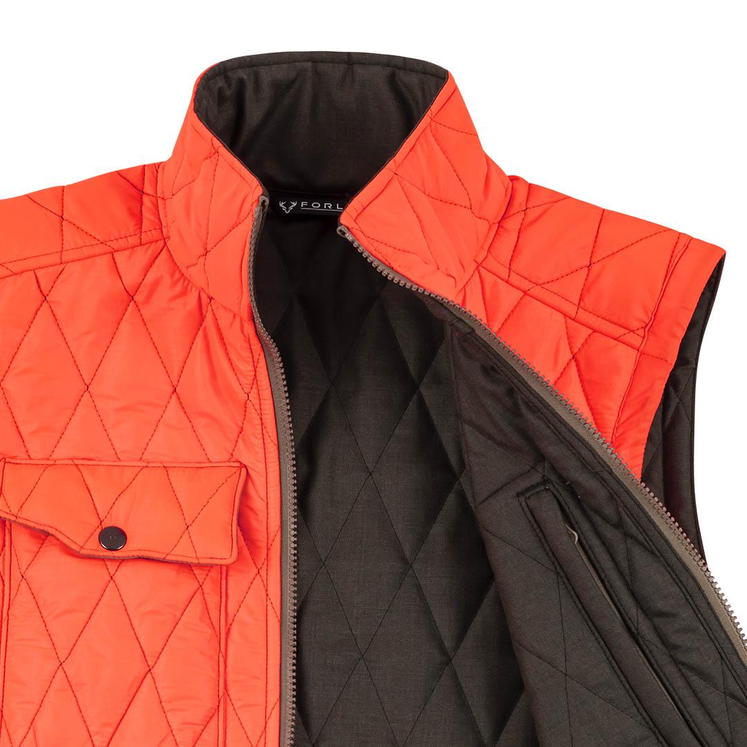 Chaleco reversible de lana merino de alta densidad para hombre.